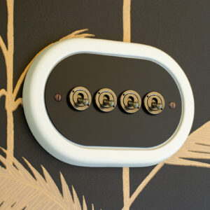 4 Gang Black Switch With Brass Toggle